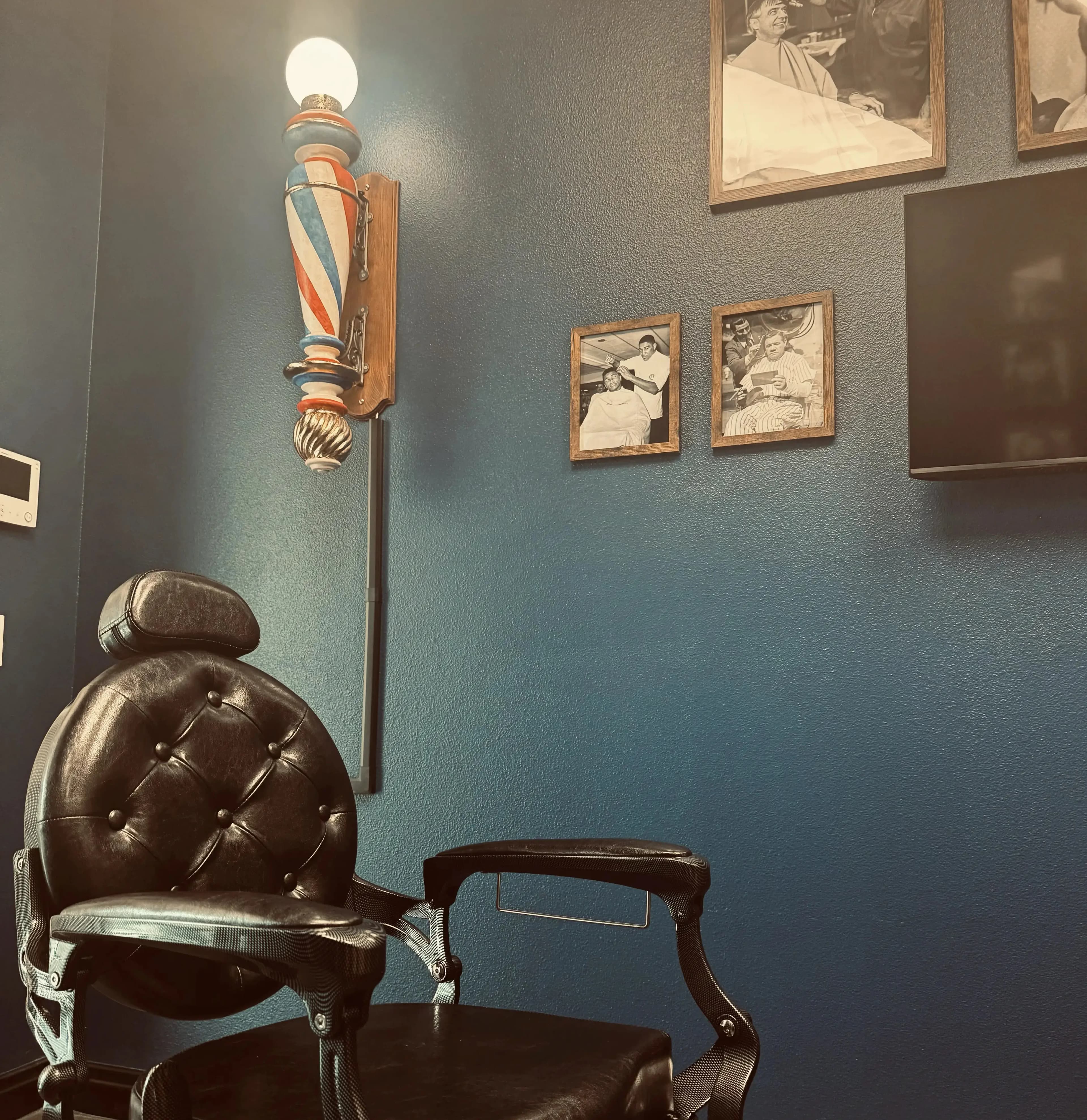 barber chair, barber pole and classic celebrities getting haircuts